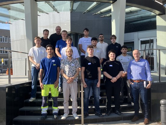 Group photo of trainees on the building site