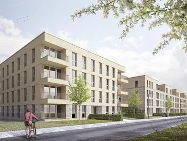 Visual der York Kaserne in MĂŒnster; Bild schrĂ€g von der Seite; 4-Stöckiges GebĂ€ude; Im Hintergrund noch 2 weitere Wohnkomplexe sichtbar; im Vordergrund lĂ€uft ein Fahrradfahrer; vor dem GebĂ€ude steht ein Baum